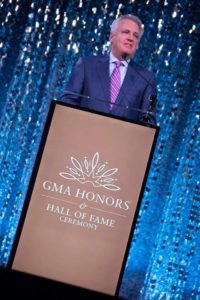 Ed Leonard introducing Karen Peck Gooch at the GMA Hall of Fame honors. (Chip Woods Photography)