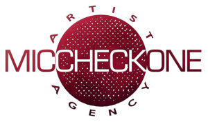 The Kendricks sign with Mic Check One