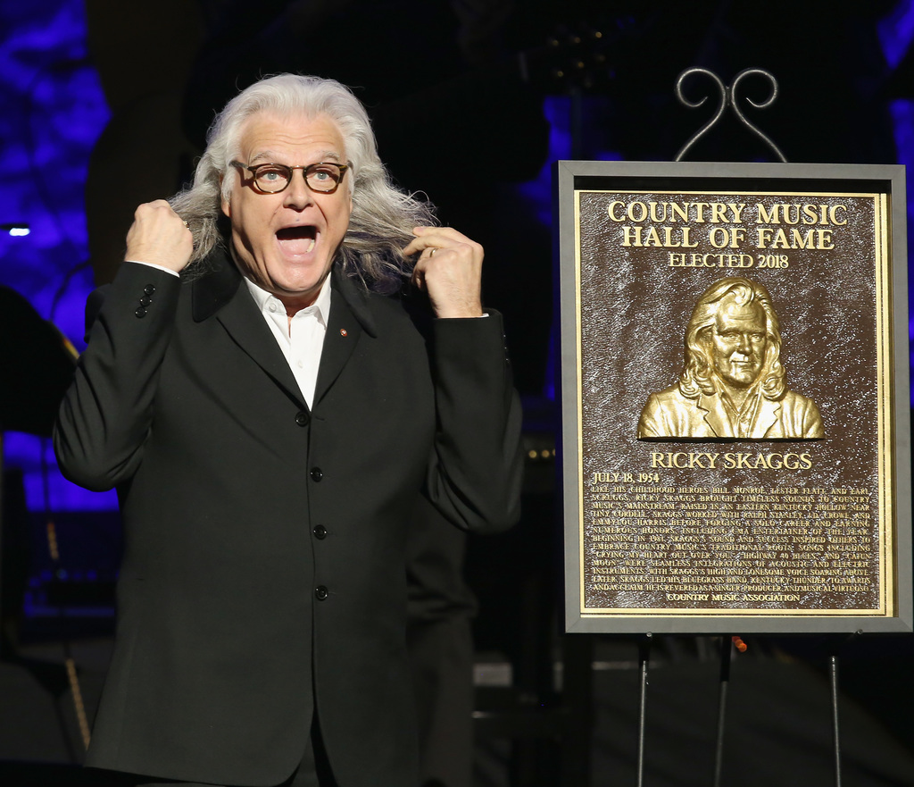 Ricky Skaggs exclaims over his likeness depicted on his newly unveiled Country Music Hall of Fame bronze plaque Photo credit: Terry Wyatt/Getty Images for Country Music Hall Of Fame
