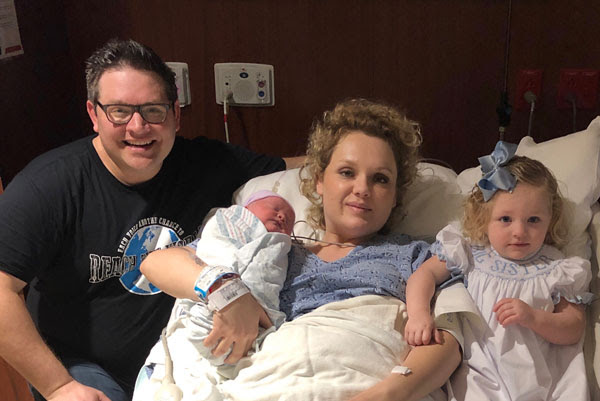 Avenue welcomes new baby: Kasey and Haley Kemp shown with new baby boy, Autry and big sister, Avaline